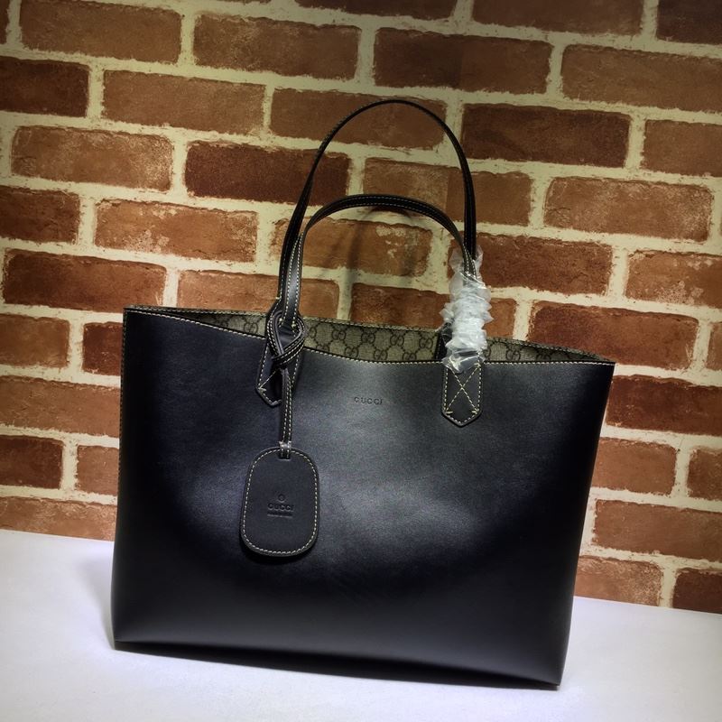 G*u*i shopping bags